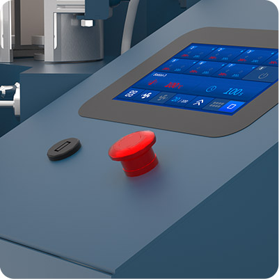 Red emergency stop button next to the touchscreen control panel